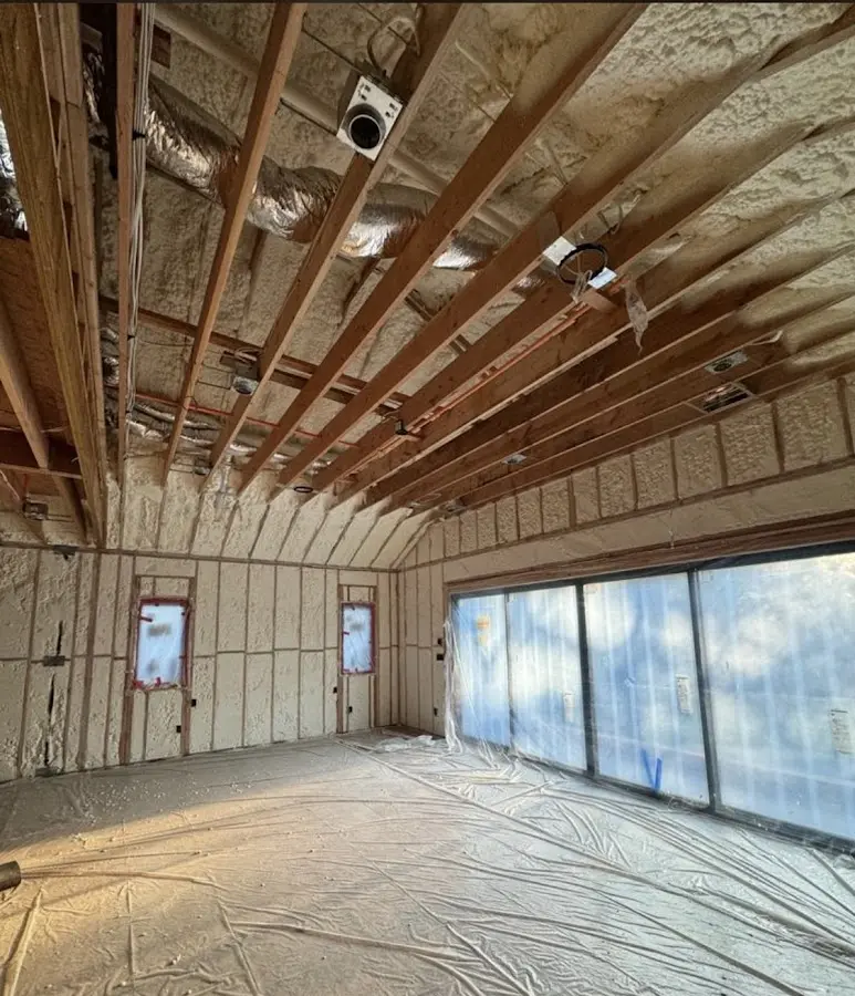 Interior walls and ceiling insulated with spray foam during new construction in Douglas